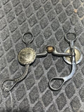 Port with cricket concho shank bit
