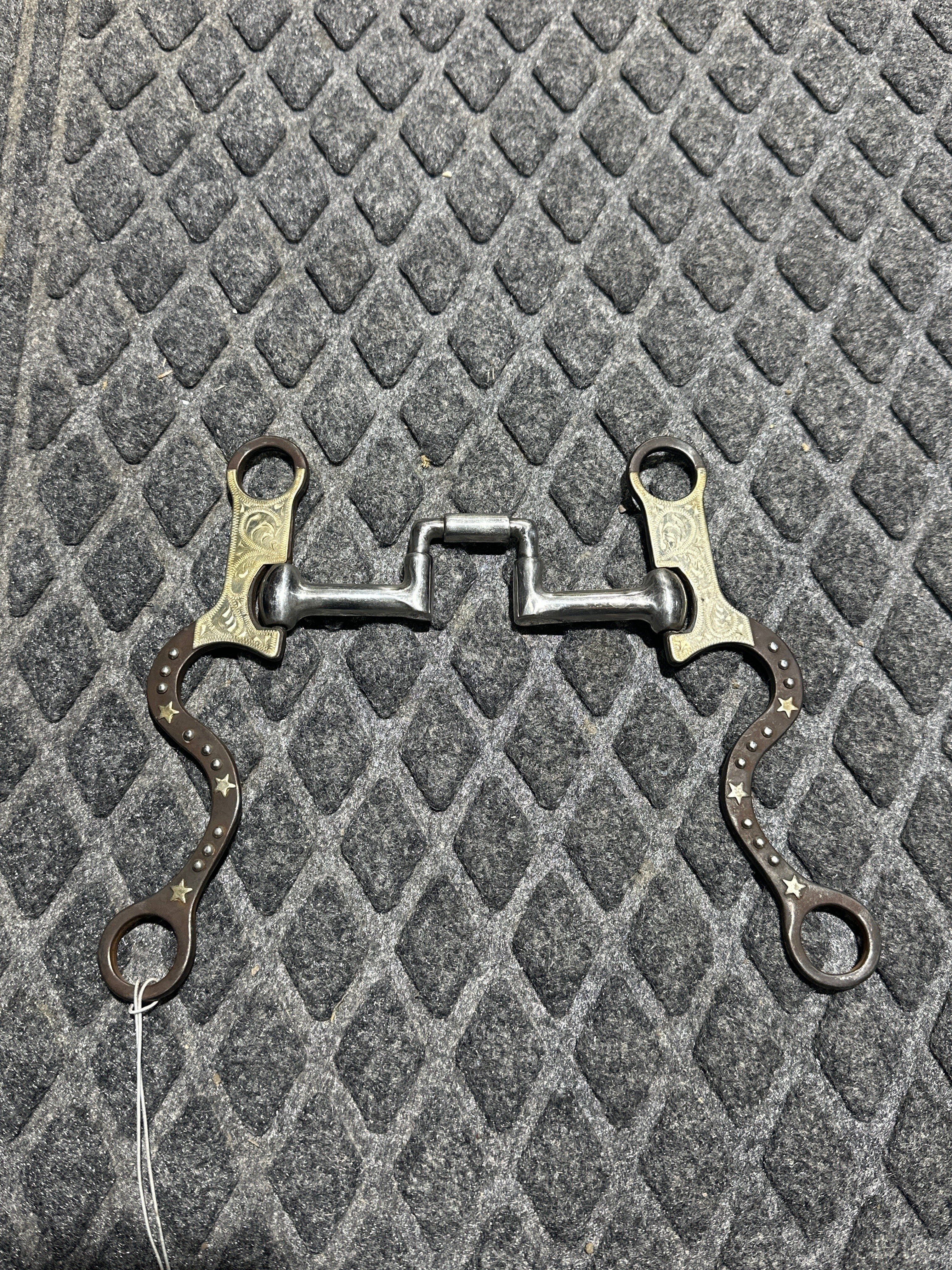Correctional port with roller and silver accent shanks