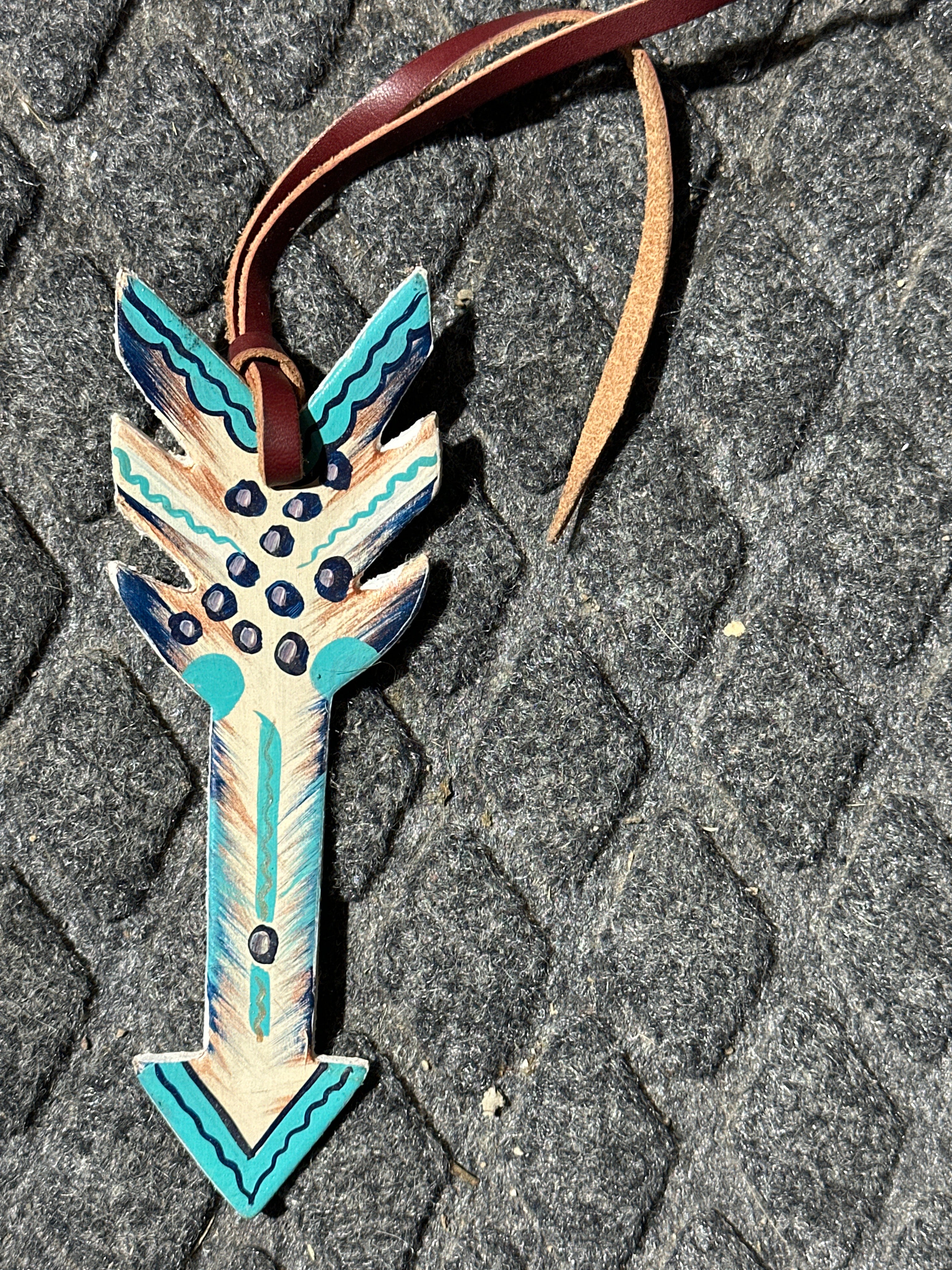 Turquoise & earth tone painted arrow tie on saddle charm
