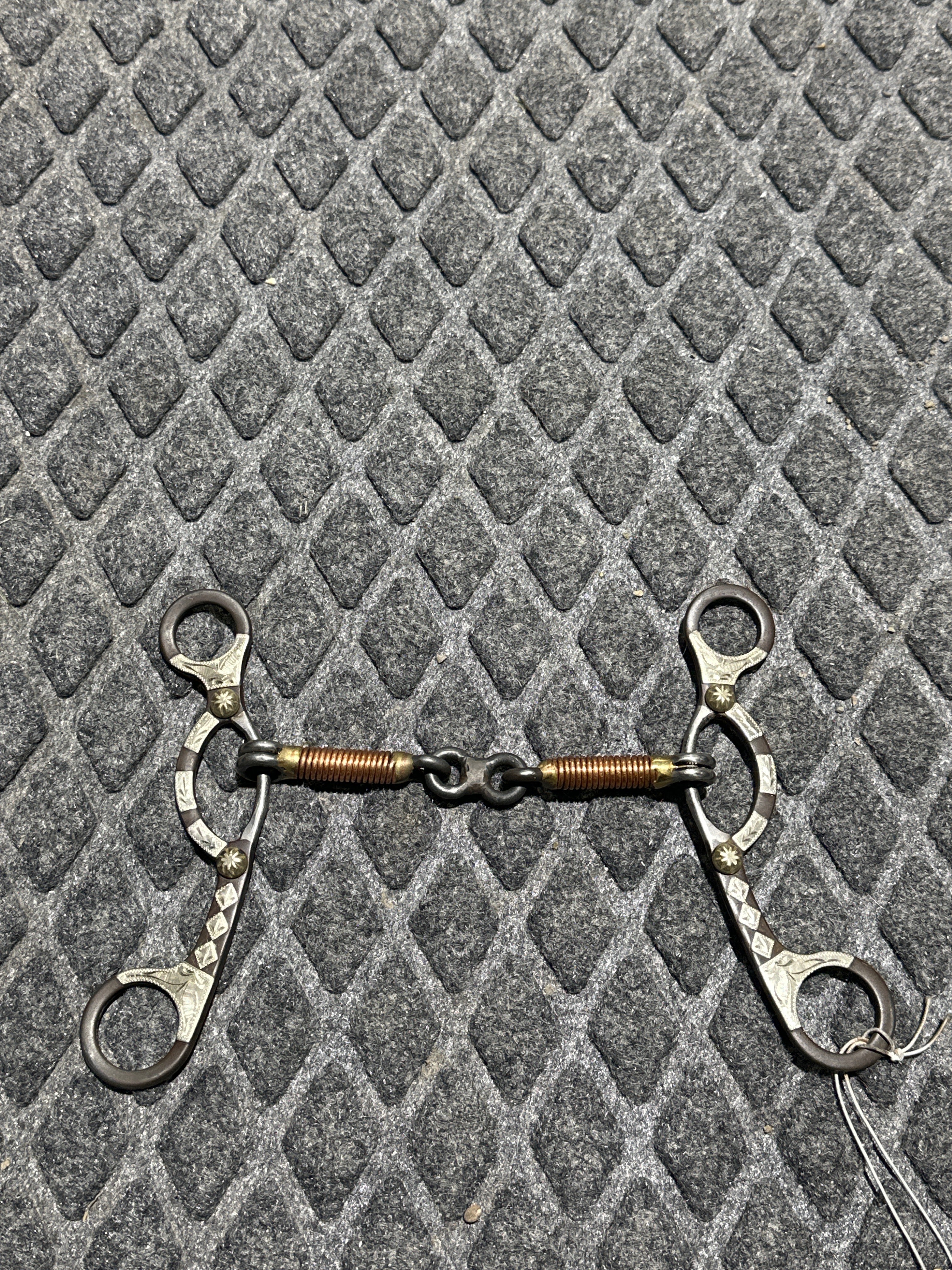 Brown steel sliding gag bit with silver overlay shanks