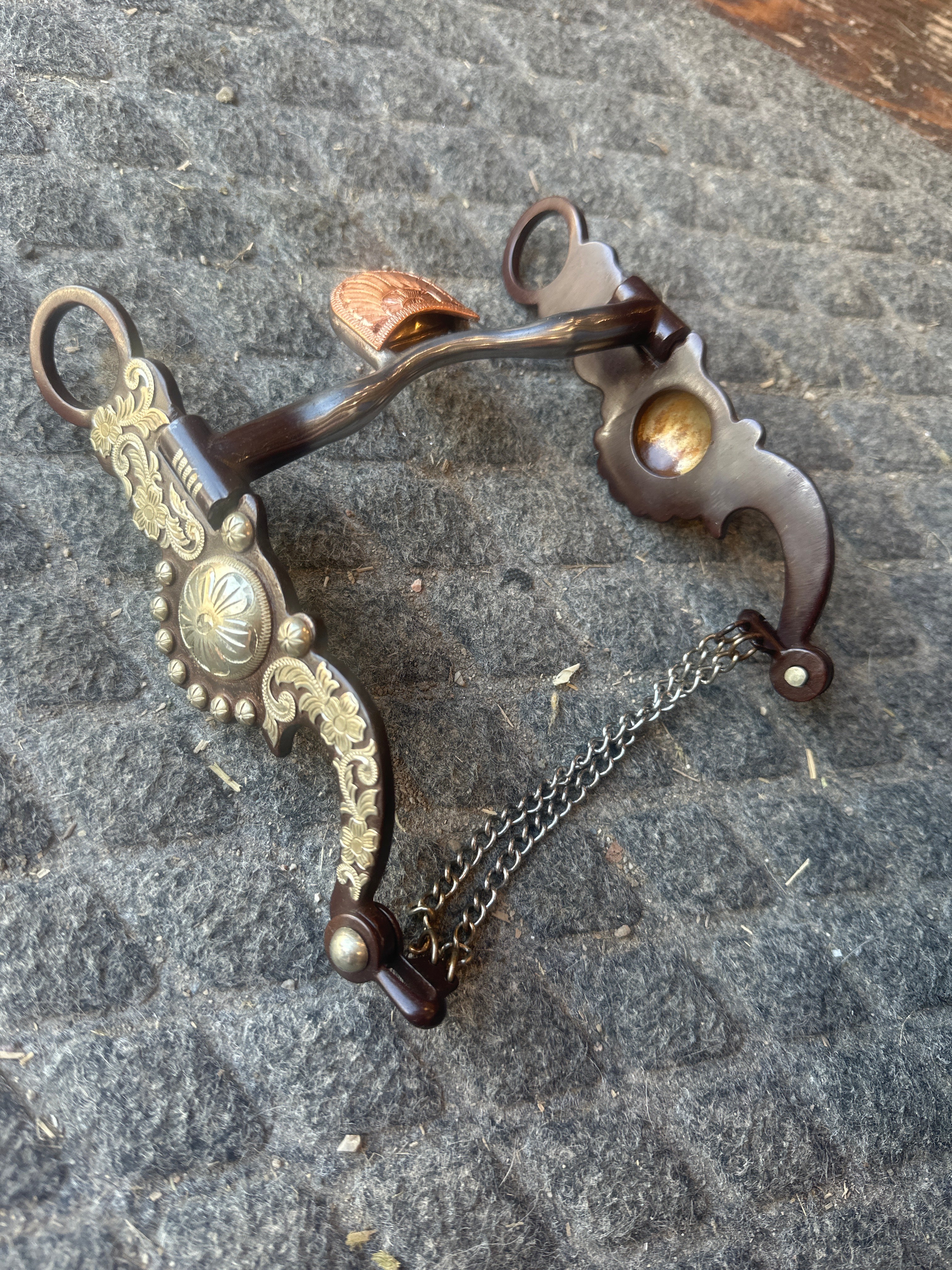 Antique show bit with German silver floral trim and spoon mouth with copper roller