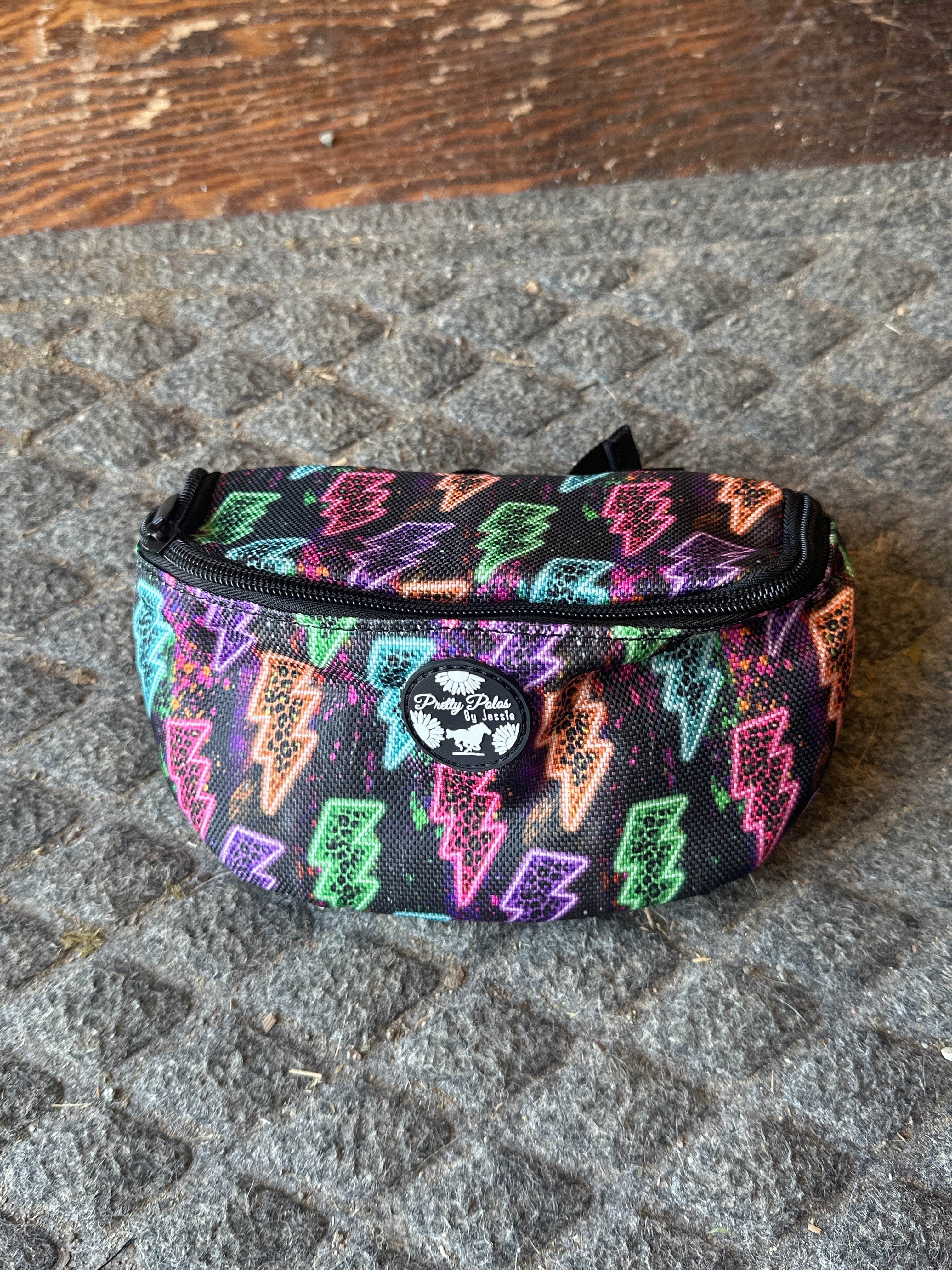 Pretty polos by Jessie neon lightning bolt Saddle sack ￼