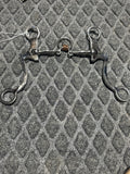 7 shank bit smooth snaffle with floating port with rollers