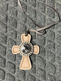 Light tone cross with barrel racer center tie on saddle charm