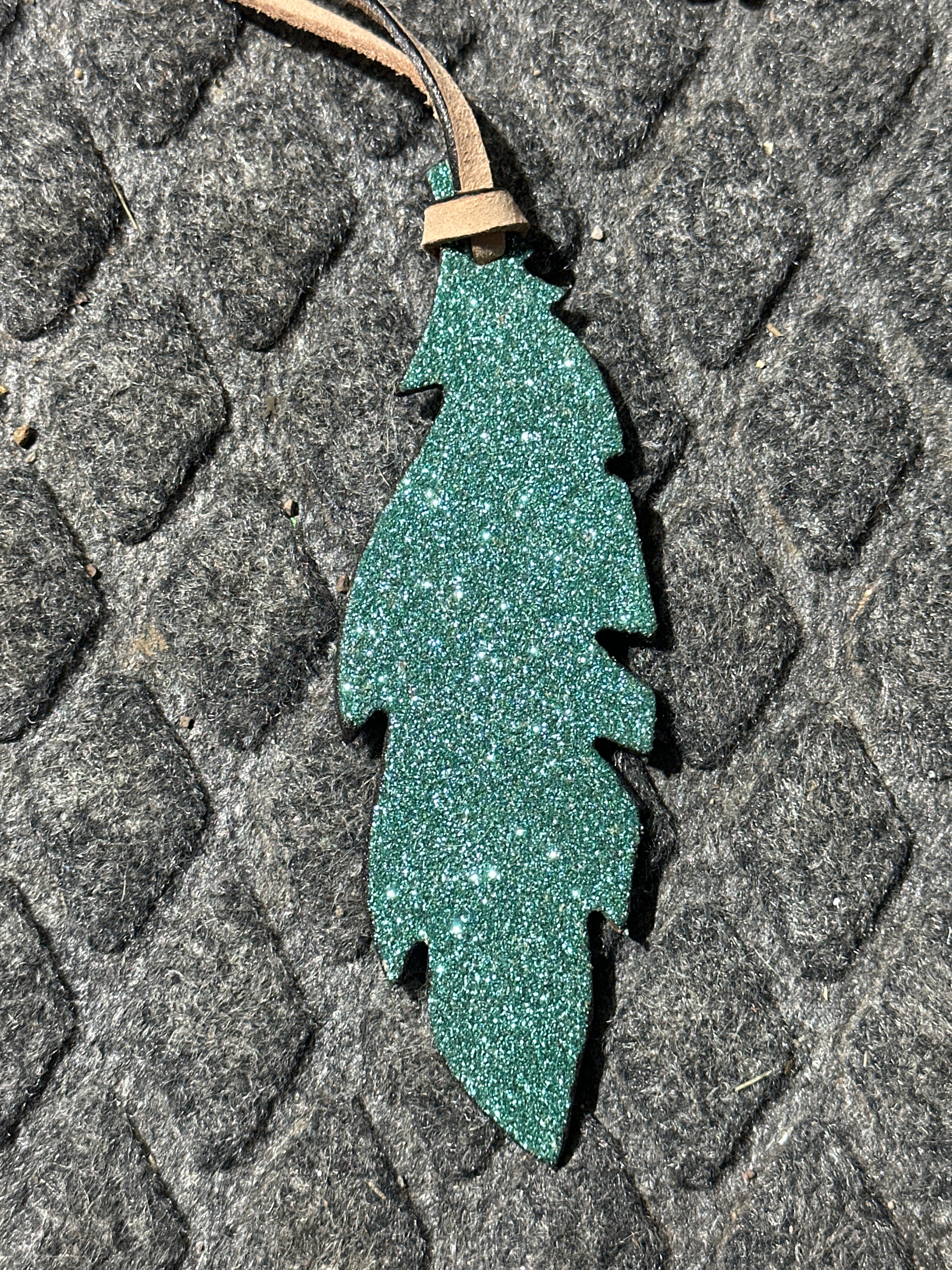 Sparkley teal tie on saddle feather