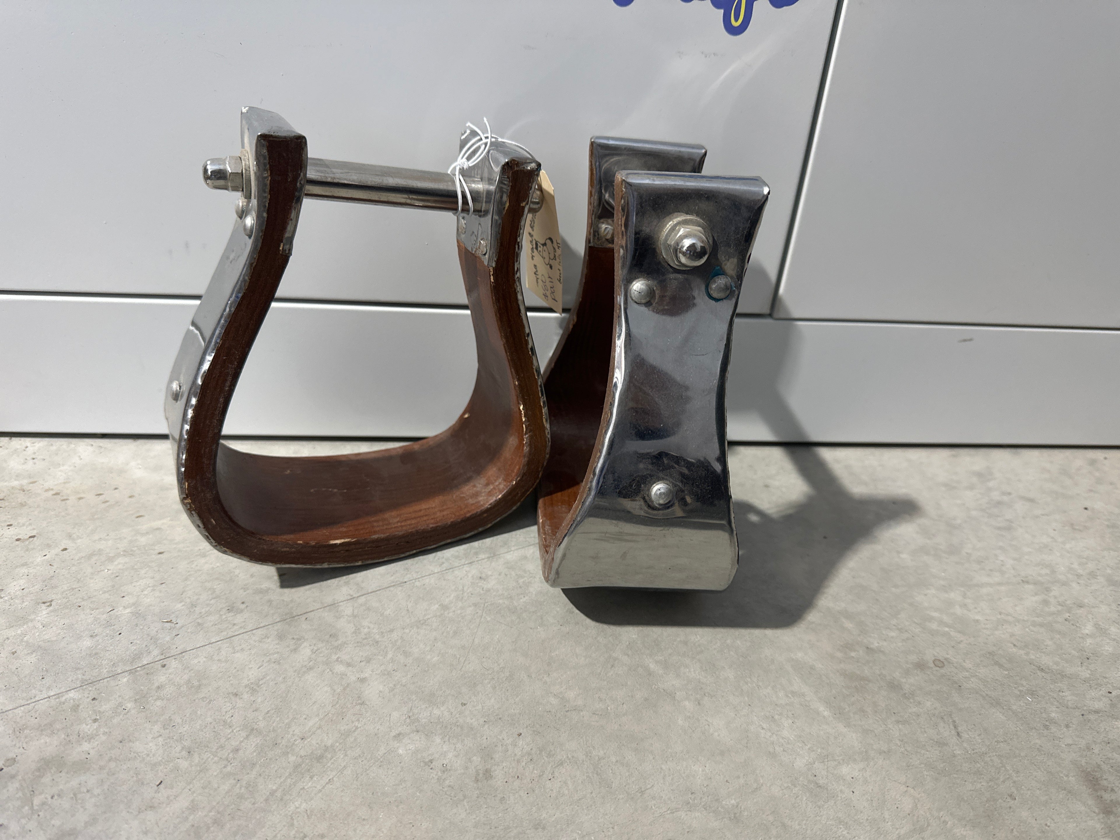 4” tread polished stainless steel covered wood stirrups