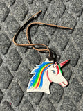Unicorn tie on saddle charm