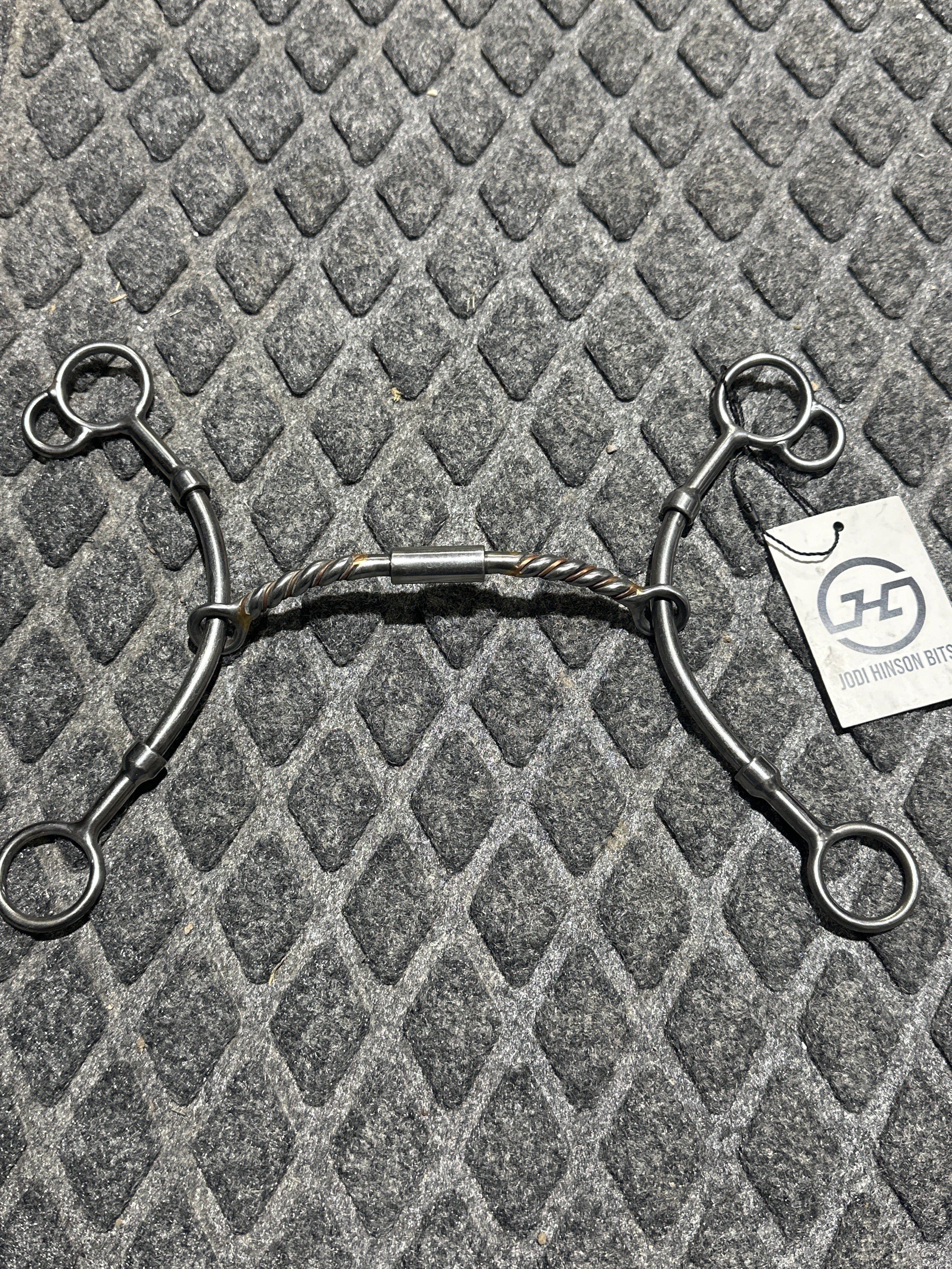 Twisted wire with copper and roller sliding gag bit by Jodi Hinson