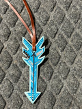 Turquoise painted arrow tie on saddle charm