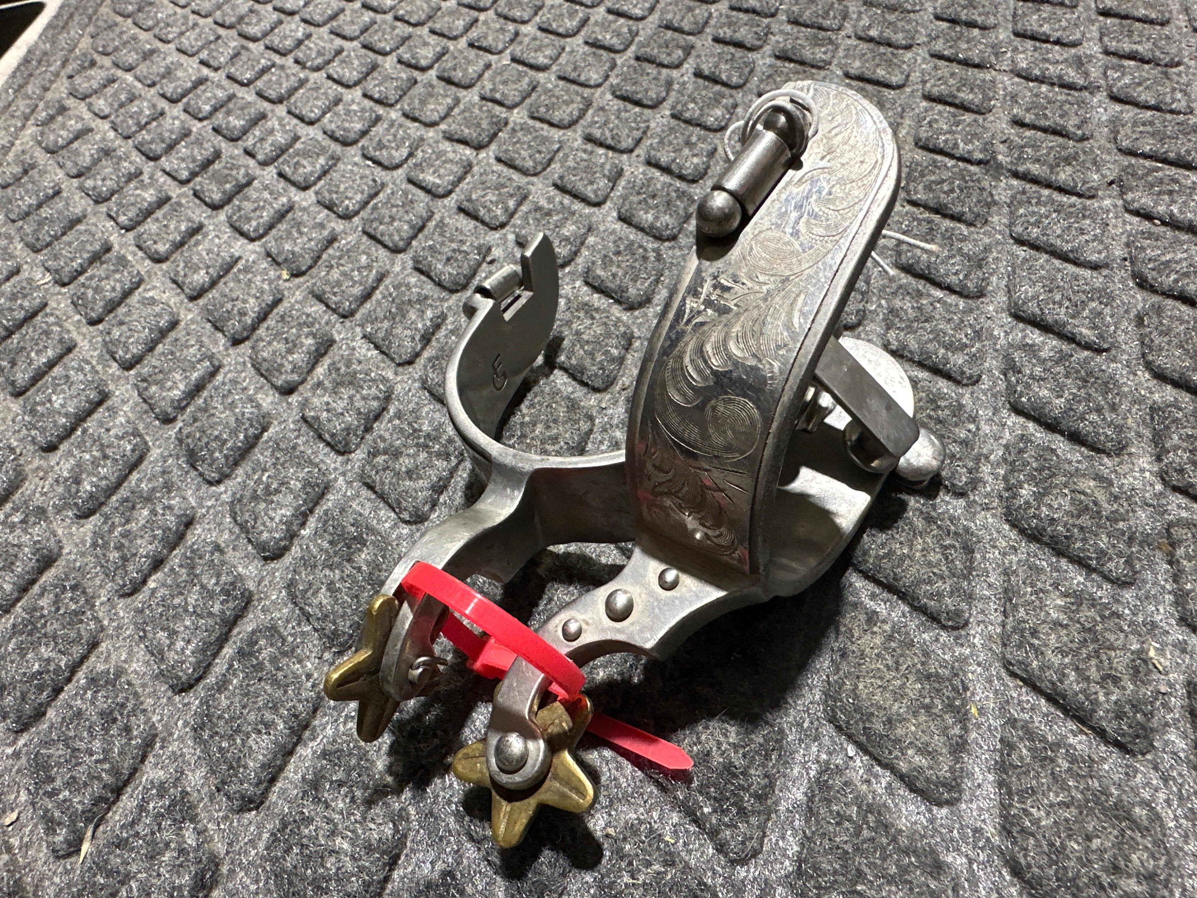 Engraved spurs
