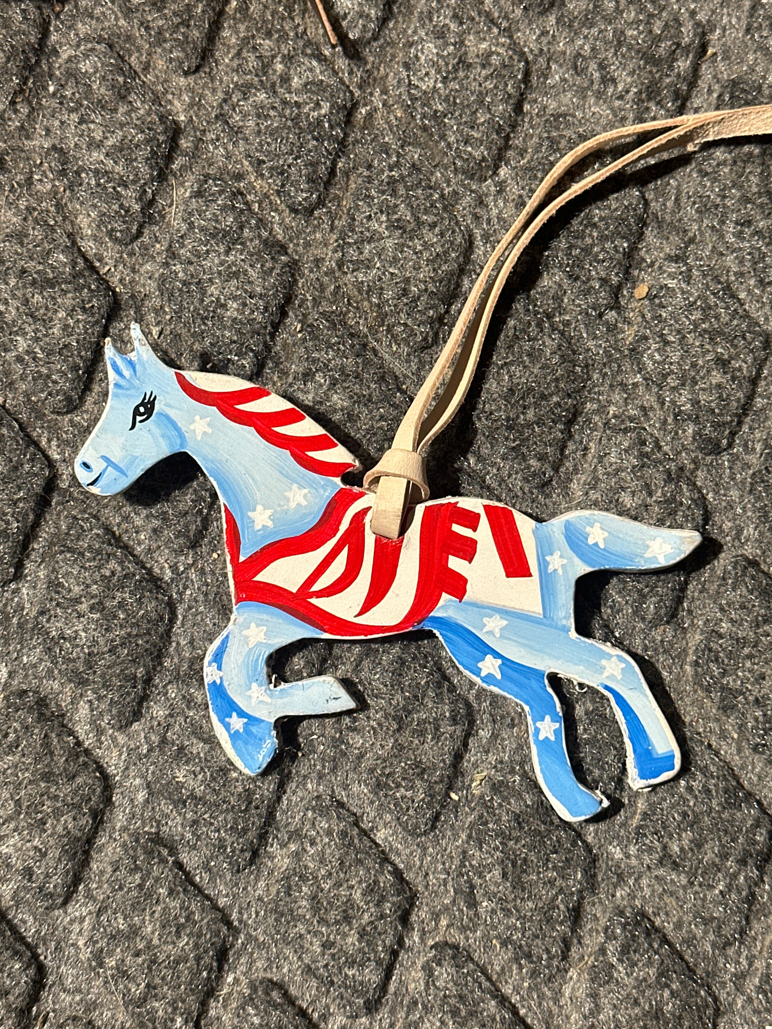 Patriotic painted horse tie on saddle charm