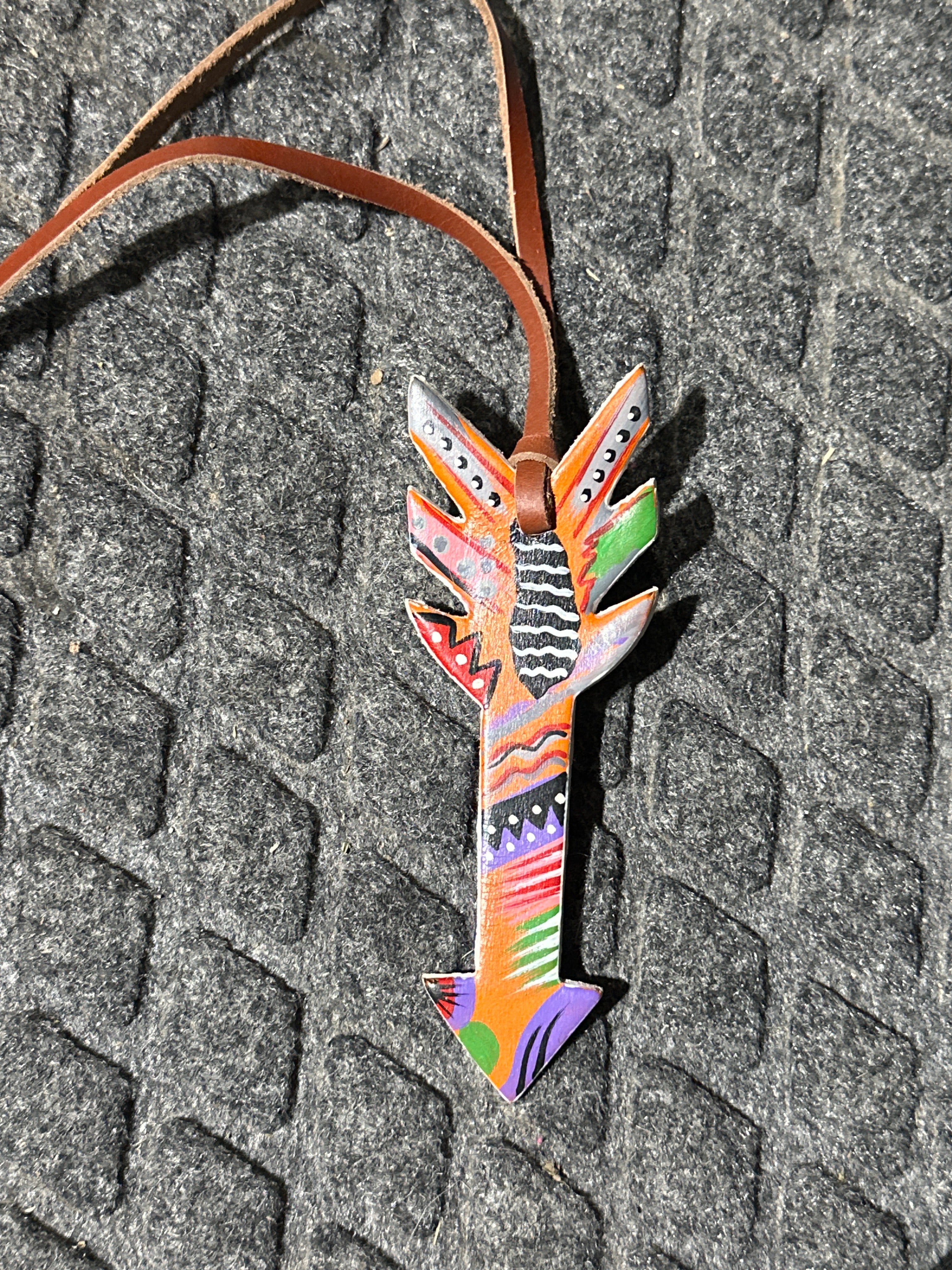 Fiesta painted arrow tie on saddle charm
