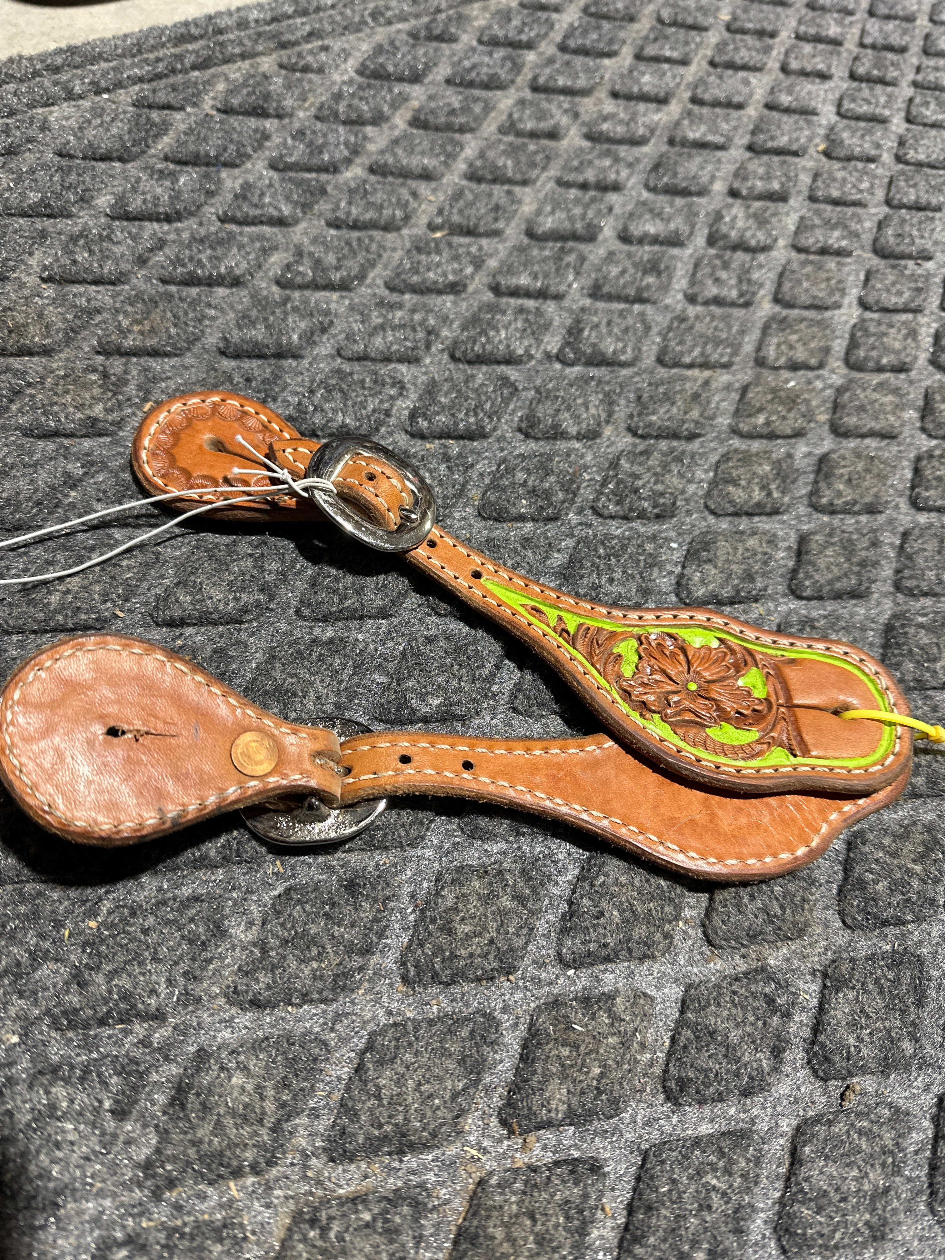 Tooled with lime green painted background spur straps