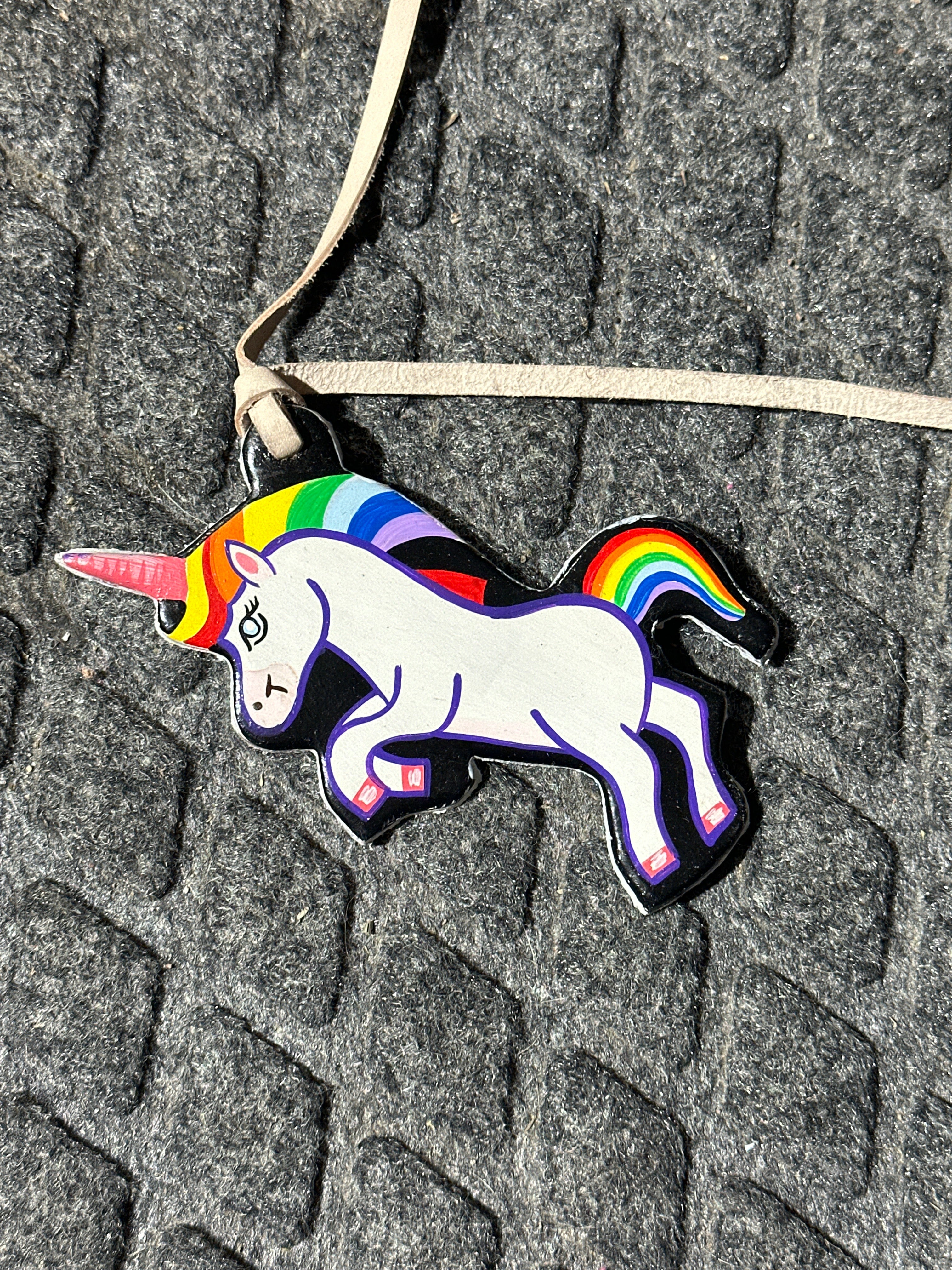 Hot to trot rainbow painted unicorn tie on saddle charm