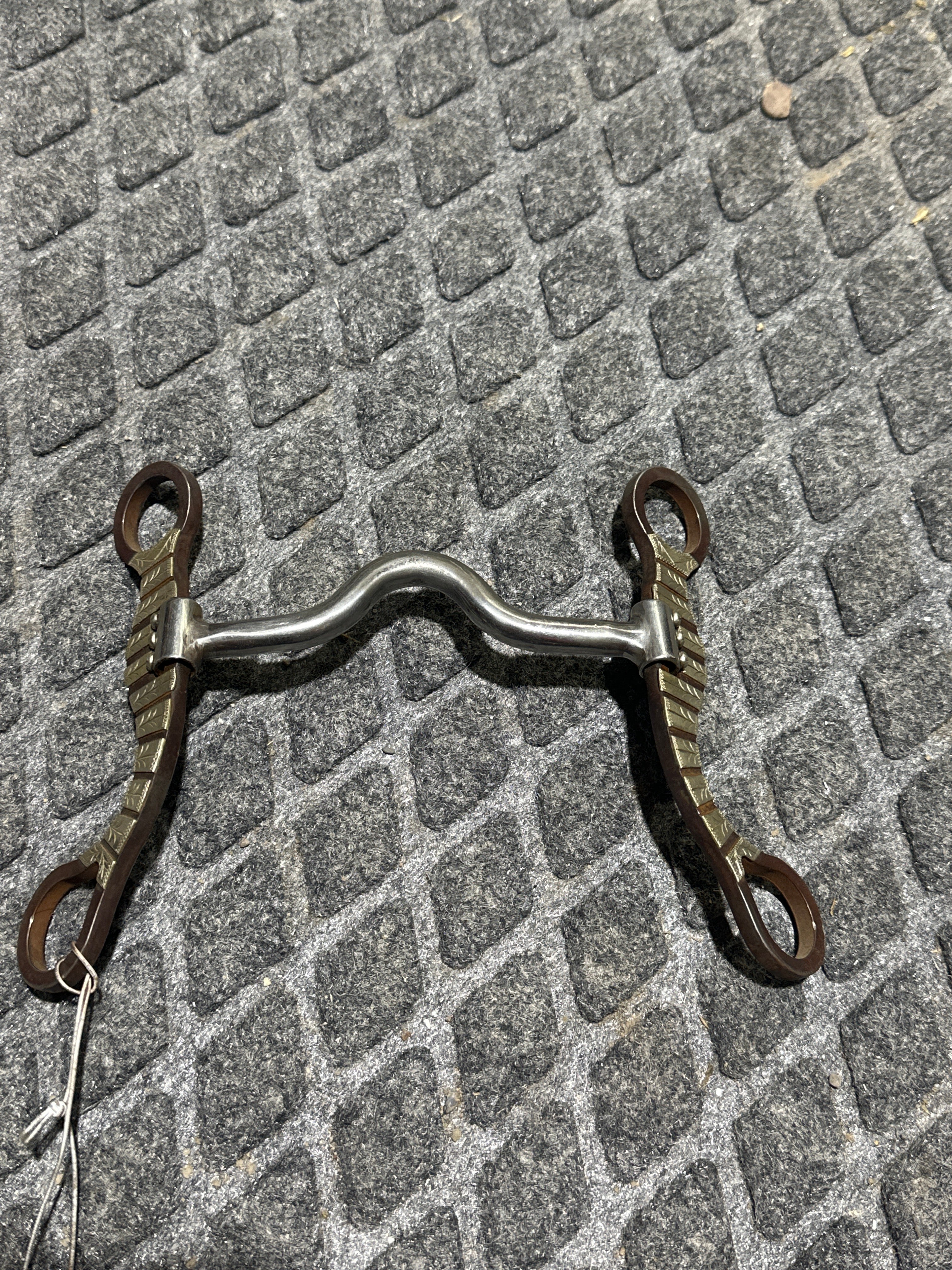 Solid port swivel silver overlay shank bit
