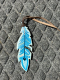 Turquoise painted tie on saddle feather