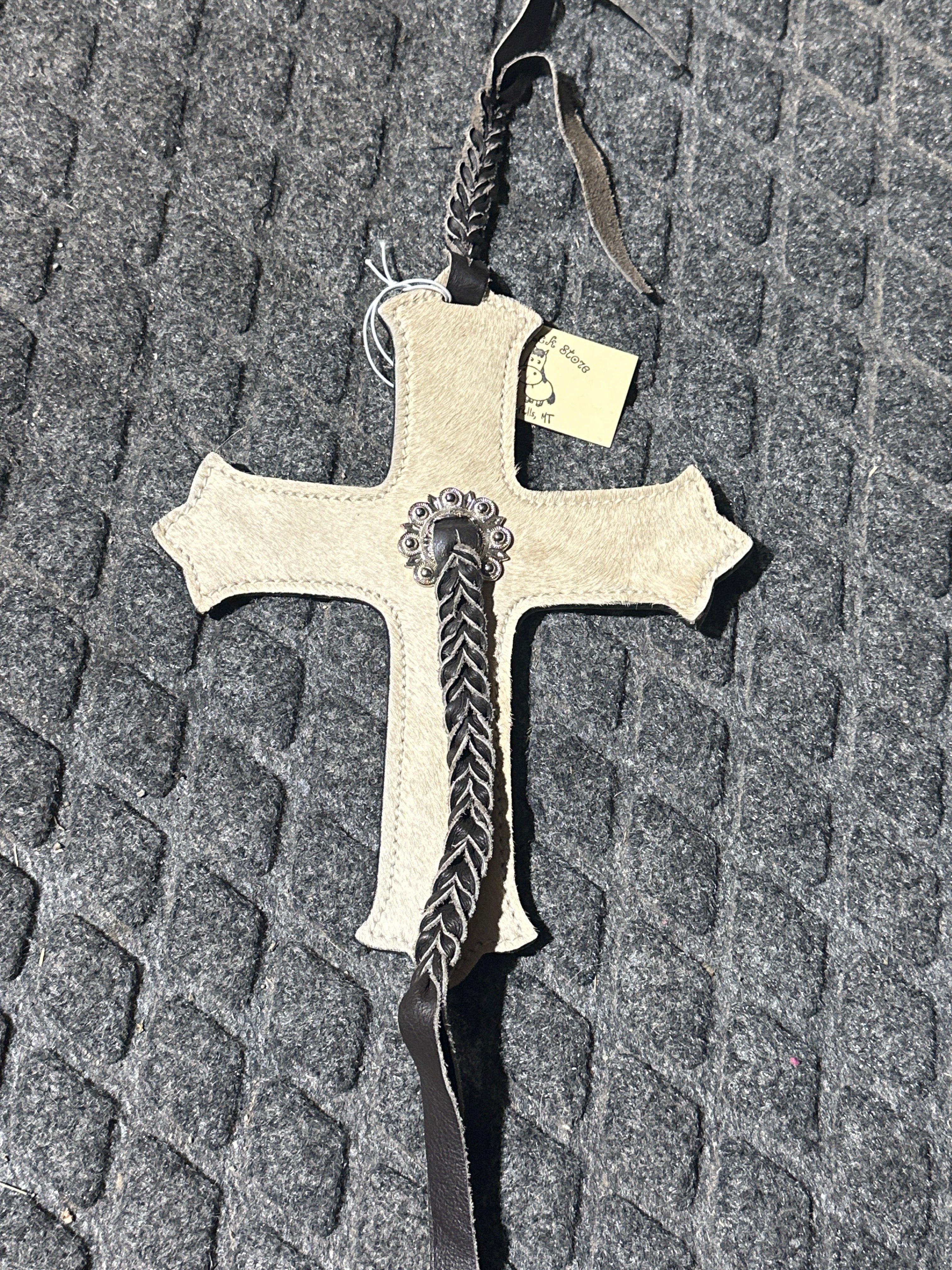 Cross with braided accents tie on saddle charm