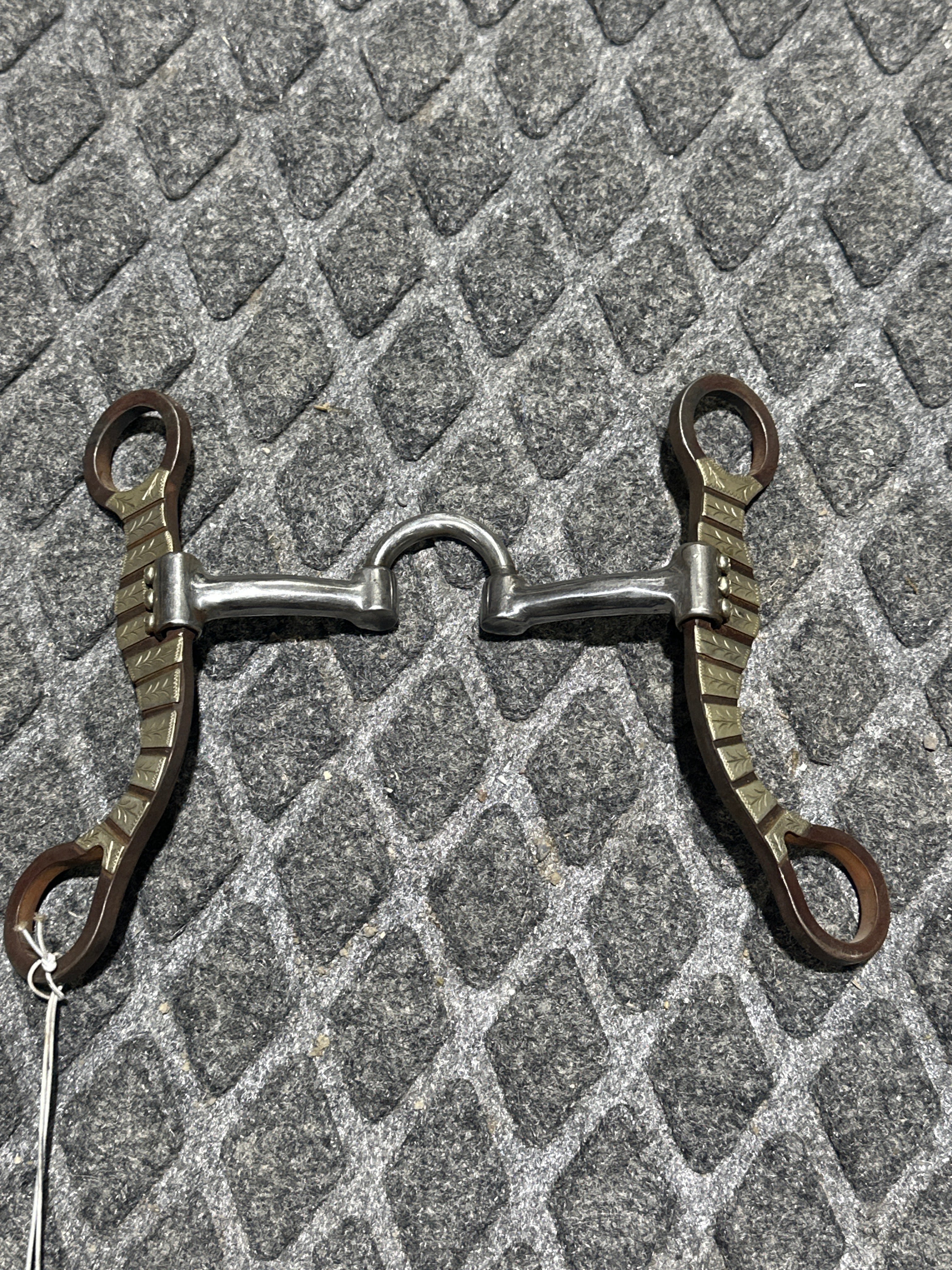 Swivel low port silver overlay shanks bit