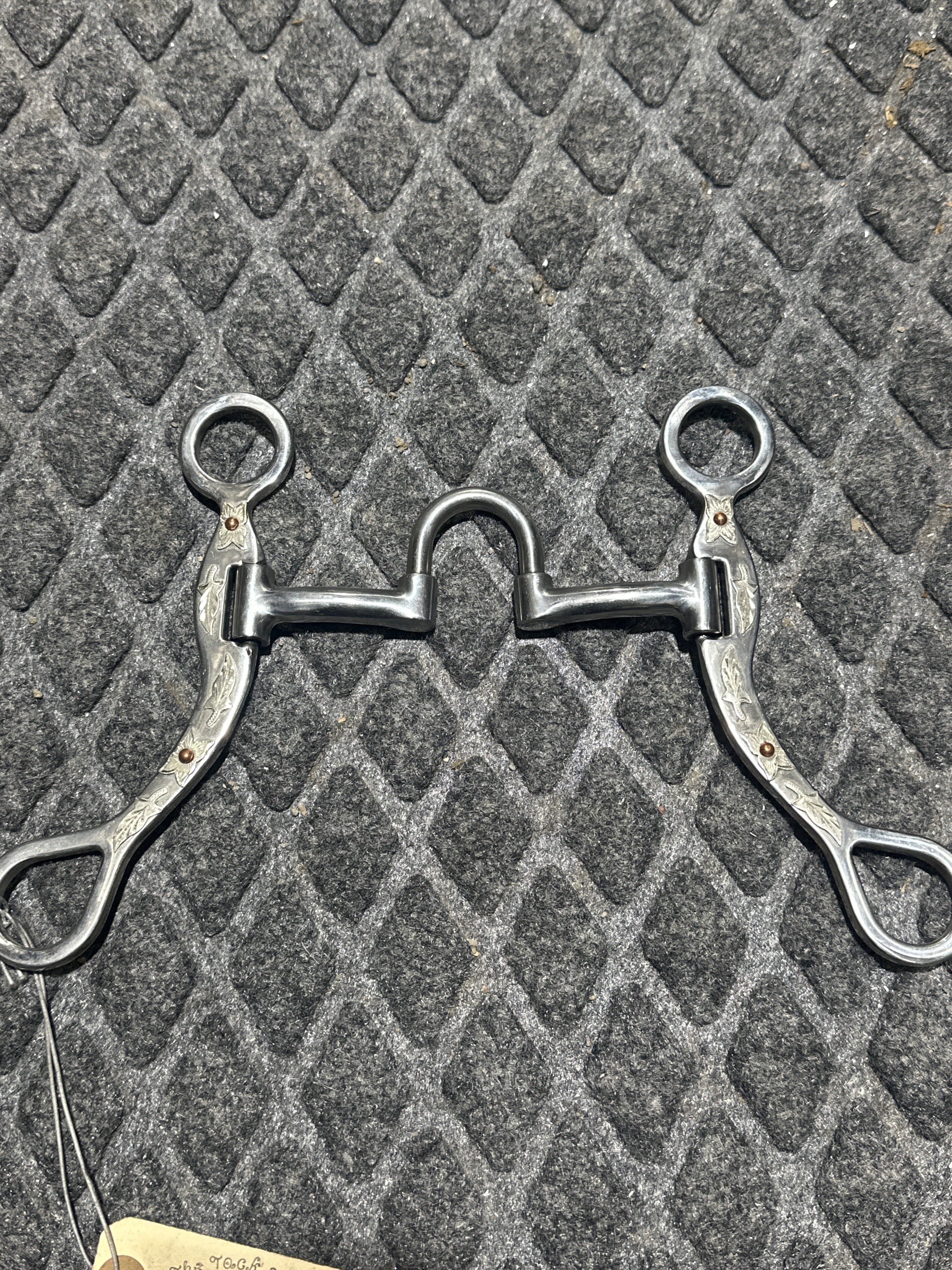Swivel port with silver floral overlay shanks