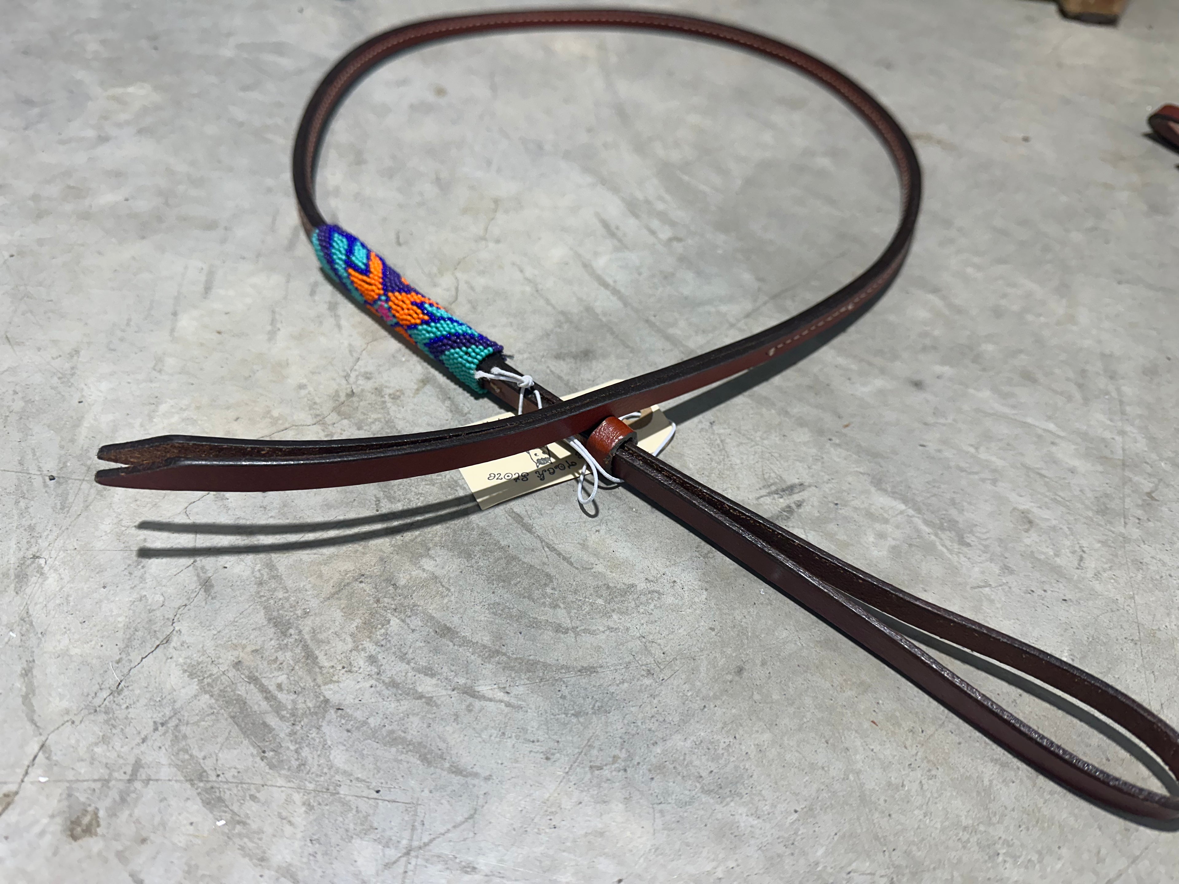 Purple, teal & orange beaded over & under