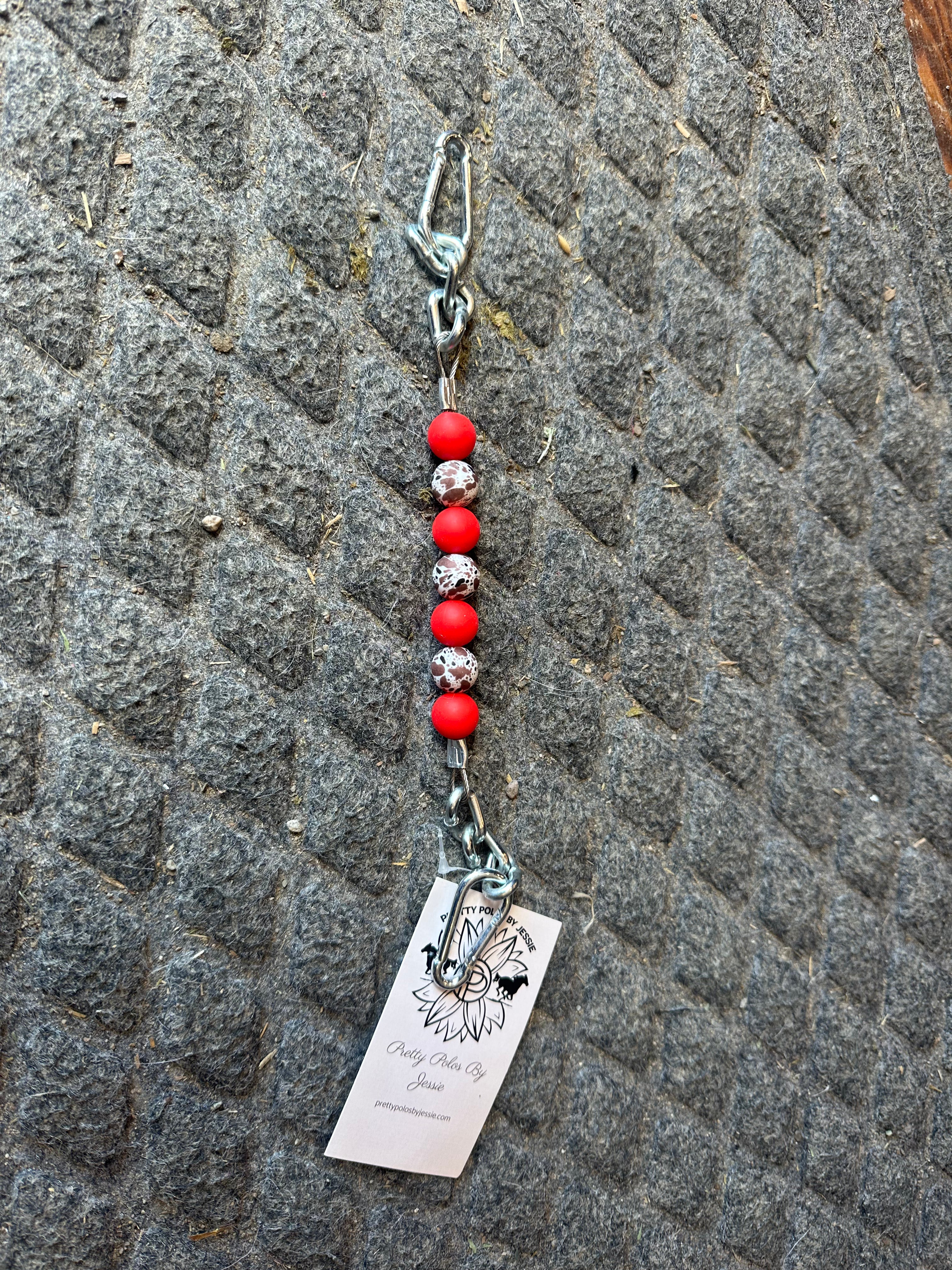 Pretty polos by Jessie red cow print silicone beaded curb strap ￼